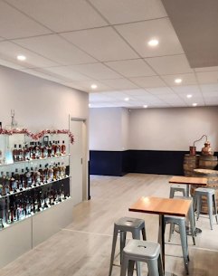 Retail shelving and seating under ceiling downlights